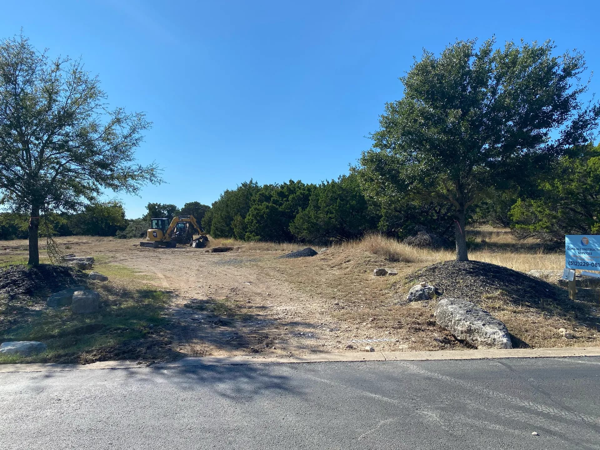 The property during early site work, with equipment on site