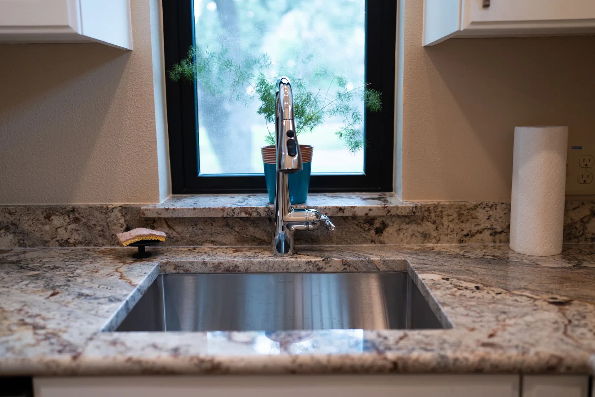 Kitchen sink and window in Domain’s Tan Container ADU