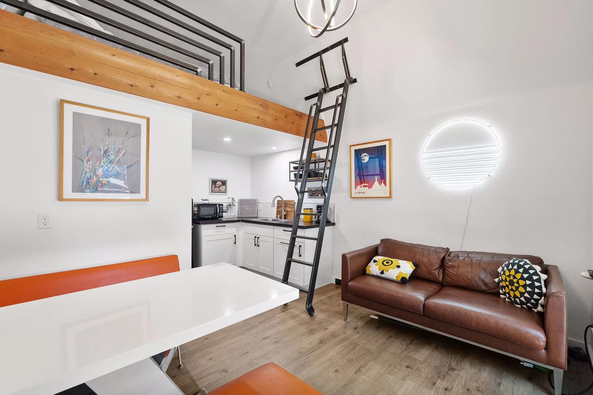 Living and dining space beneath the loft in Domain’s East Austin Tuff Shed ADU